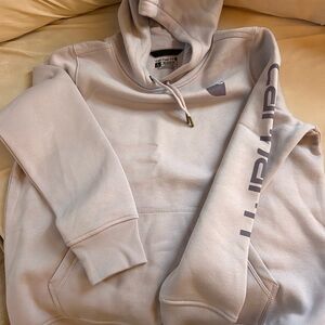 Never worn/washed carhartt lavender sweatshirt. Tags cut off but was too small